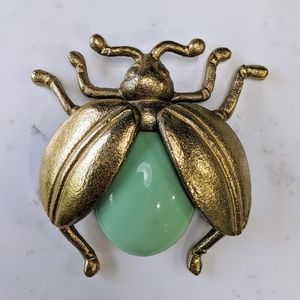 Brass and jade beetle figure